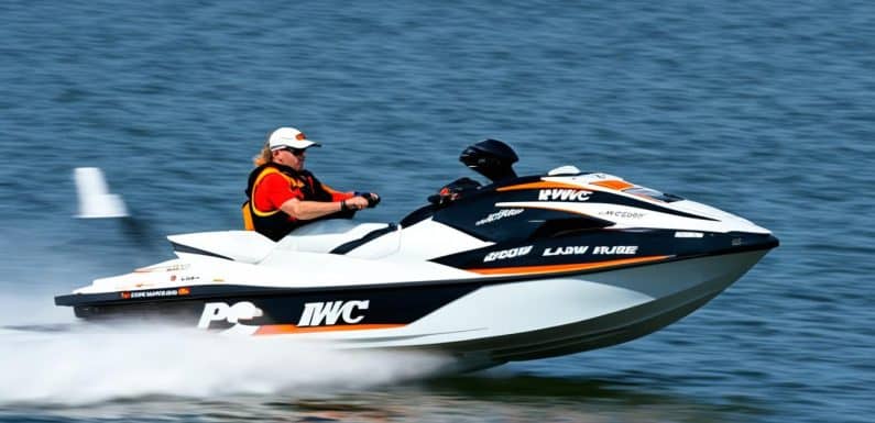 under new york law, how far from shore must a pwc be if it is going faster than 5 mph?